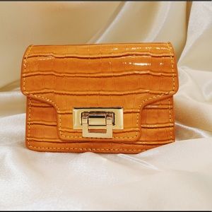 Mini orange crossbody bags